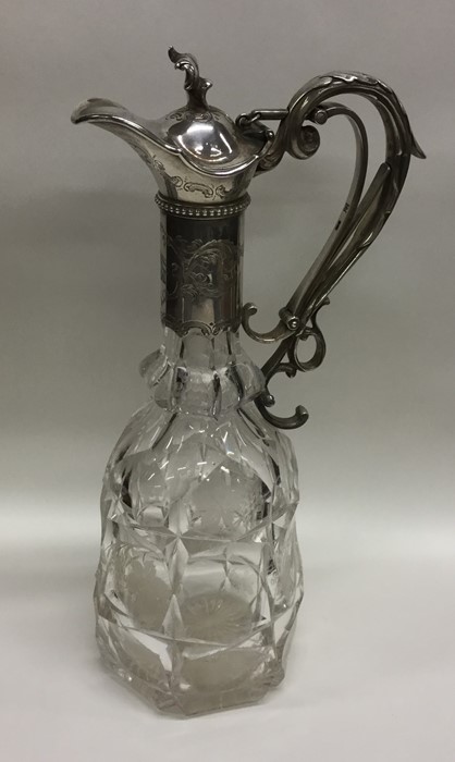 An attractive Victorian silver claret jug with etc