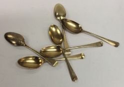 A set of six Georgian silver gilt teaspoons. Londo