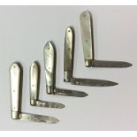A group of five small silver and MOP fruit knives.