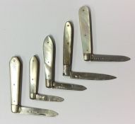 A group of five small silver and MOP fruit knives.