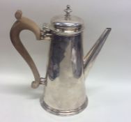 A rare Georgian Irish silver coffee pot with taper