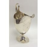 A good Georgian Scottish silver cream jug with bri