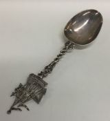 A Dutch silver spoon mounted with a galleon, beari