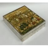 An unusual silver rectangular hinged top box with