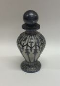 An attractive glass overlaid scent bottle with mat