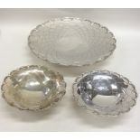 An attractive three piece silver sweet dish set wi