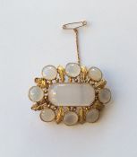 A good quality agate nine stone brooch set in gold