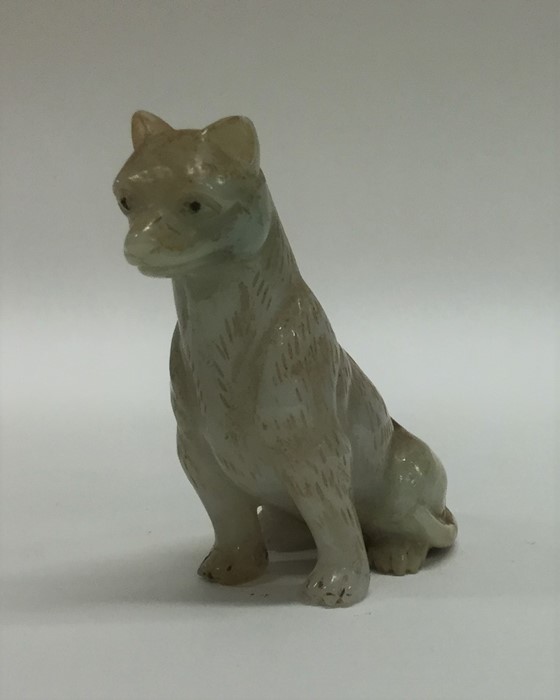 A Chinese jade figure of a cat with textured body