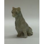 A Chinese jade figure of a cat with textured body