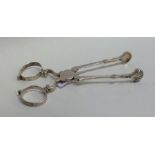 A pair of Georgian silver sugar scissors of typica