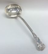 A heavy Kings' pattern silver soup ladle. Exeter.