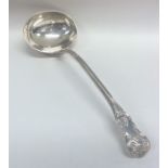 A heavy Kings' pattern silver soup ladle. Exeter.