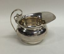 A small silver bachelor's cream jug. Birmingham. B