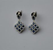 A pair of good quality sapphire and diamond drop e