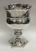 A good Georgian silver bright cut goblet decorated