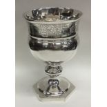 A good Georgian silver bright cut goblet decorated