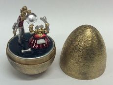 STUART DEVLIN: A cased silver and silver gilt egg
