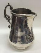 A heavy Continental silver ewer of tapering design