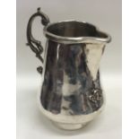 A heavy Continental silver ewer of tapering design