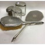 An engine turned two piece dressing table set toge