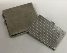 Two heavy silver engine turned cigarette cases. Ap