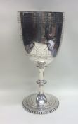 A large Victorian silver goblet with bright cut de