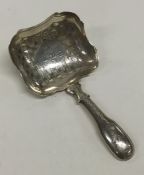 A Georgian silver bright cut caddy scoop attractiv