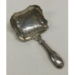 A Georgian silver bright cut caddy scoop attractiv