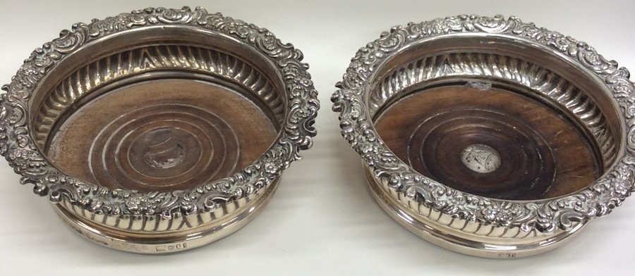 A good pair of Georgian silver wine coasters, the - Image 2 of 2