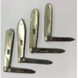 A group of four silver and MOP fruit knives. Vario