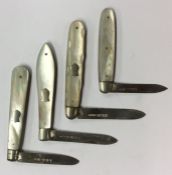 A group of four silver and MOP fruit knives. Vario