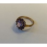 A 9 carat amethyst cluster ring. Approx. 3.2 grams