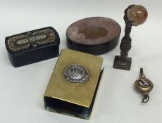 A papier-mâché snuff box together with a watch key