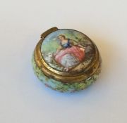 An attractive enamelled patch pot with hinged lid