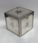 An unusual Georgian silver tea caddy in the form o