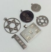 Heavy silver ingots, Jewish medallions etc. Approx