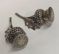 A good pair of silver cruets in the form of thistl