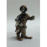 A Continental silver model of a musician. Approx.