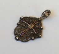 An Antique amethyst and diamond pendant with pierc