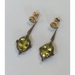 A good pair of large diamond mounted drop earrings