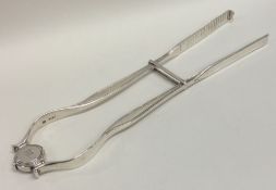 A pair of 18th Century silver asparagus tongs with