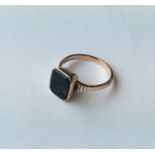 A gent's 9 carat bloodstone set signet ring. Appro