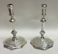 A heavy pair of cast silver taper sticks. Birmingh