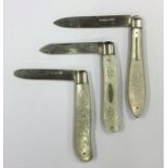 A group of four silver and MOP fruit knives decora