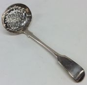 A heavy silver fiddle pattern sifter spoon. London