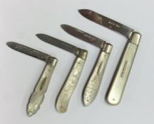 A group of four silver and MOP fruit knives decora