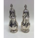 A good pair of Edwardian silver sugar casters with