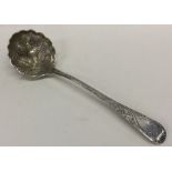 A Georgian silver chased ladle decorated with flow