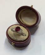A good ruby and diamond five stone ring in 18 cara