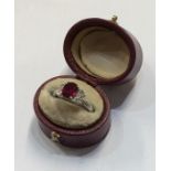 A good ruby and diamond five stone ring in 18 cara